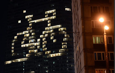 Earth Hour window lights in the shape of a bicycle