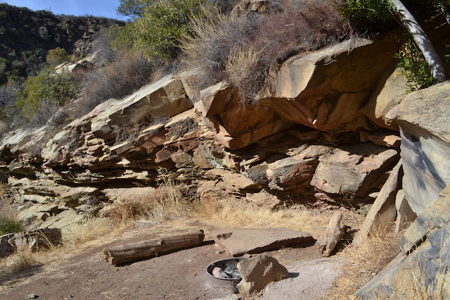 camp site by rocks