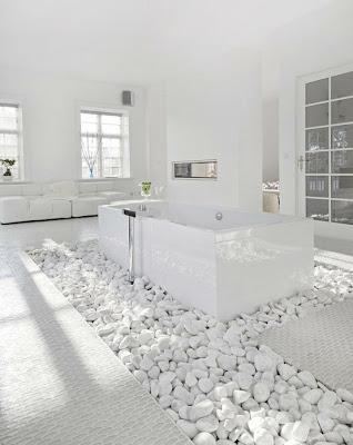 white bath tub in white stones - gorgeous