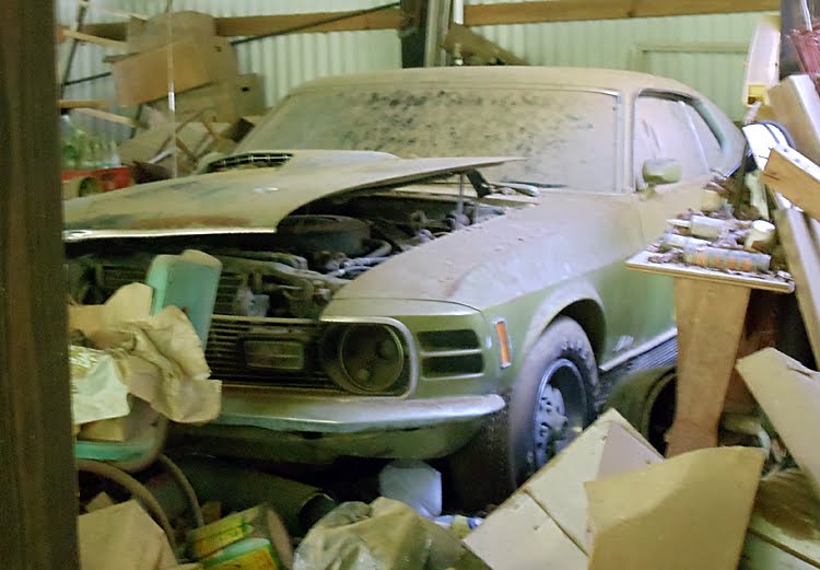 This 1970 Mustang Mach 1 was found covered in dirt and surrounded by clutter