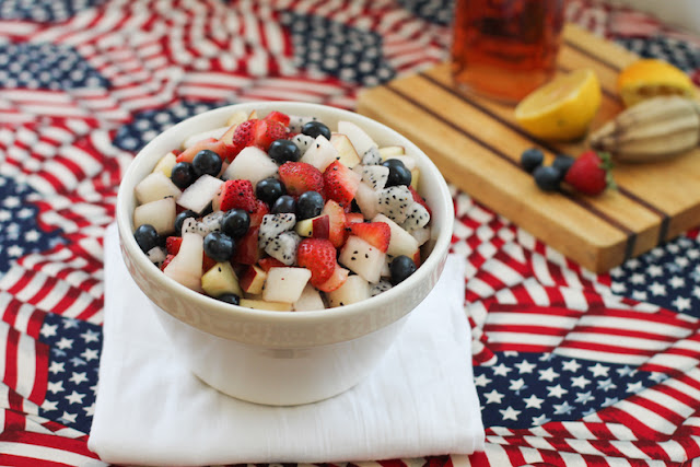 Food Lust People Love: Not so much of a recipe as a way to add flavor and sweetness, the flavored alcohol makes this boozy red white and blue fruit salad a great adult treat at any summer picnic.