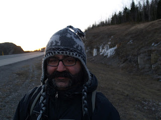 Keenan wearing a toque with braids