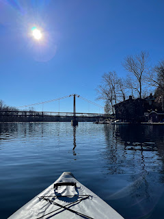 Picture of a bridge from a kayak on the water