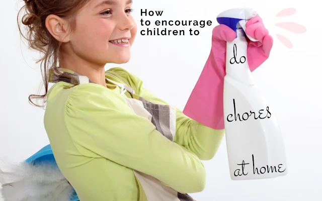 how to encourage children to do chores at home - picture of a girl spraying cleaner