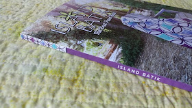 Moonrise quilt on the cover of the spring 2018 Island Batik catalog