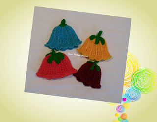 full front view of all the four preemie crochet beanies or caps