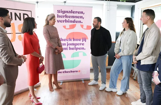 Queen Letizia wore a pink coral dress and pink coat by Carolina Herrera. Queen Maxima wore a tweed jacket by Claes Iversen