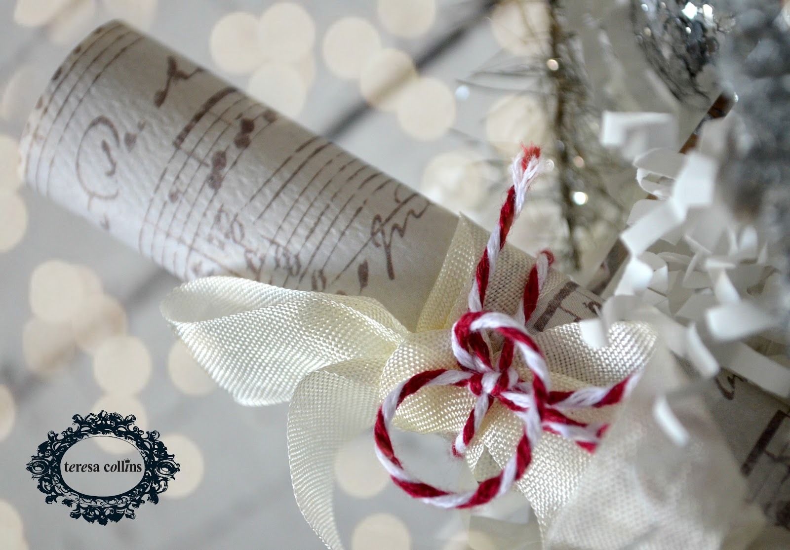 ... paper from the Christmas Cottage collection and tied it with ribbon