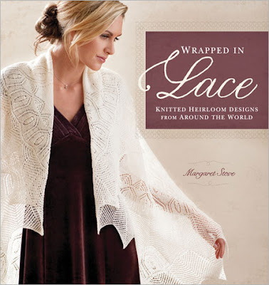 It's called Wrapped in Lace Knitted Heirloom Designs from Around the World