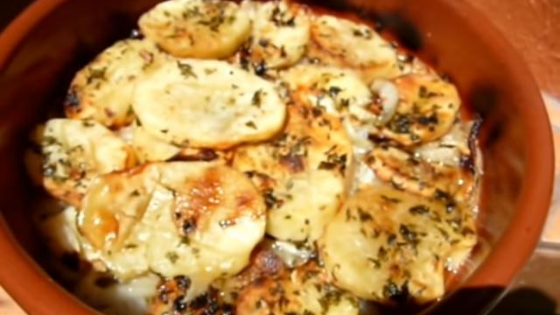Patatas asadas en horno de leña