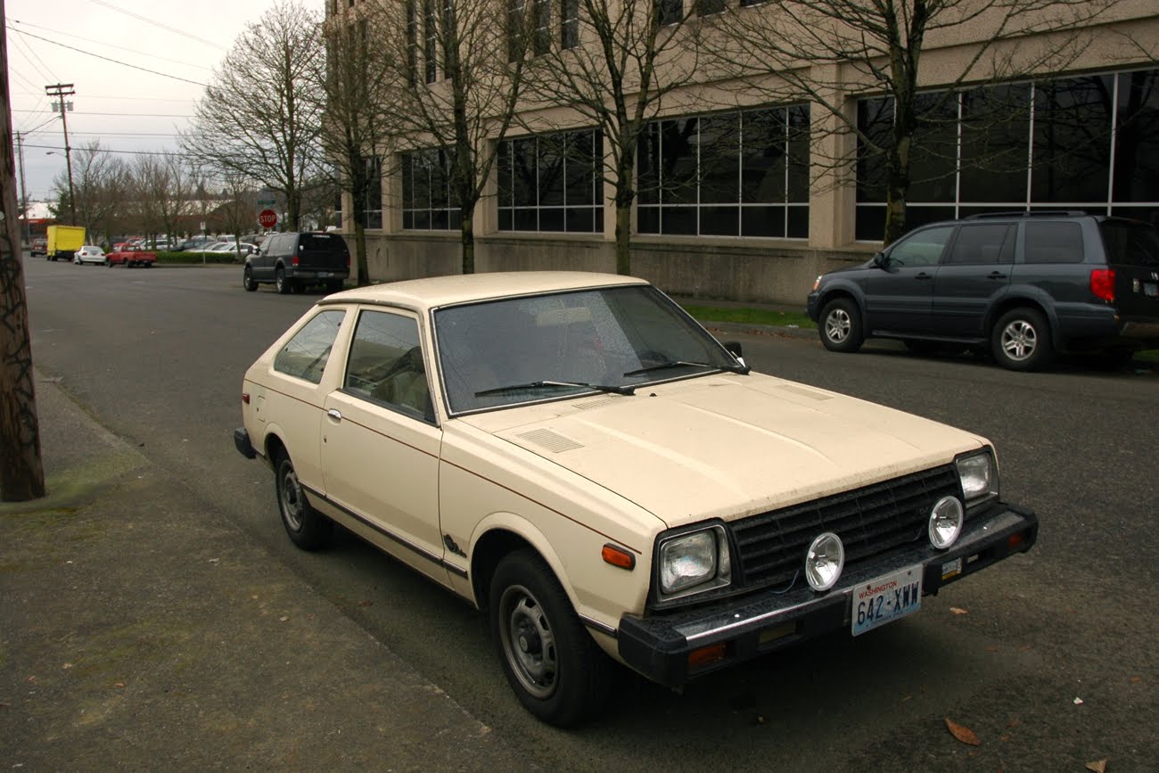 OLD PARKED CARS.: 1982 Datsun 310 GX.