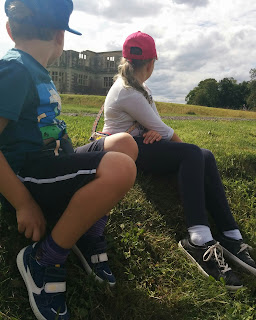 Wearing our new shoes at Lyveden New Bield