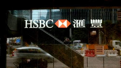 Image of HSBC's ubiquitous logo set into the marble cladding on a regular HSBC bank branch in Hong Kong.