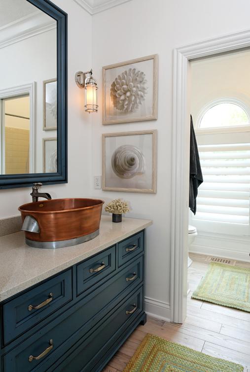Nautical Bathroom Designs : 46+ Nautical Wallpaper for Bathroom on WallpaperSafari : This small bathroom features a nautical theme using light blue paint for the sink wall and the tub base.