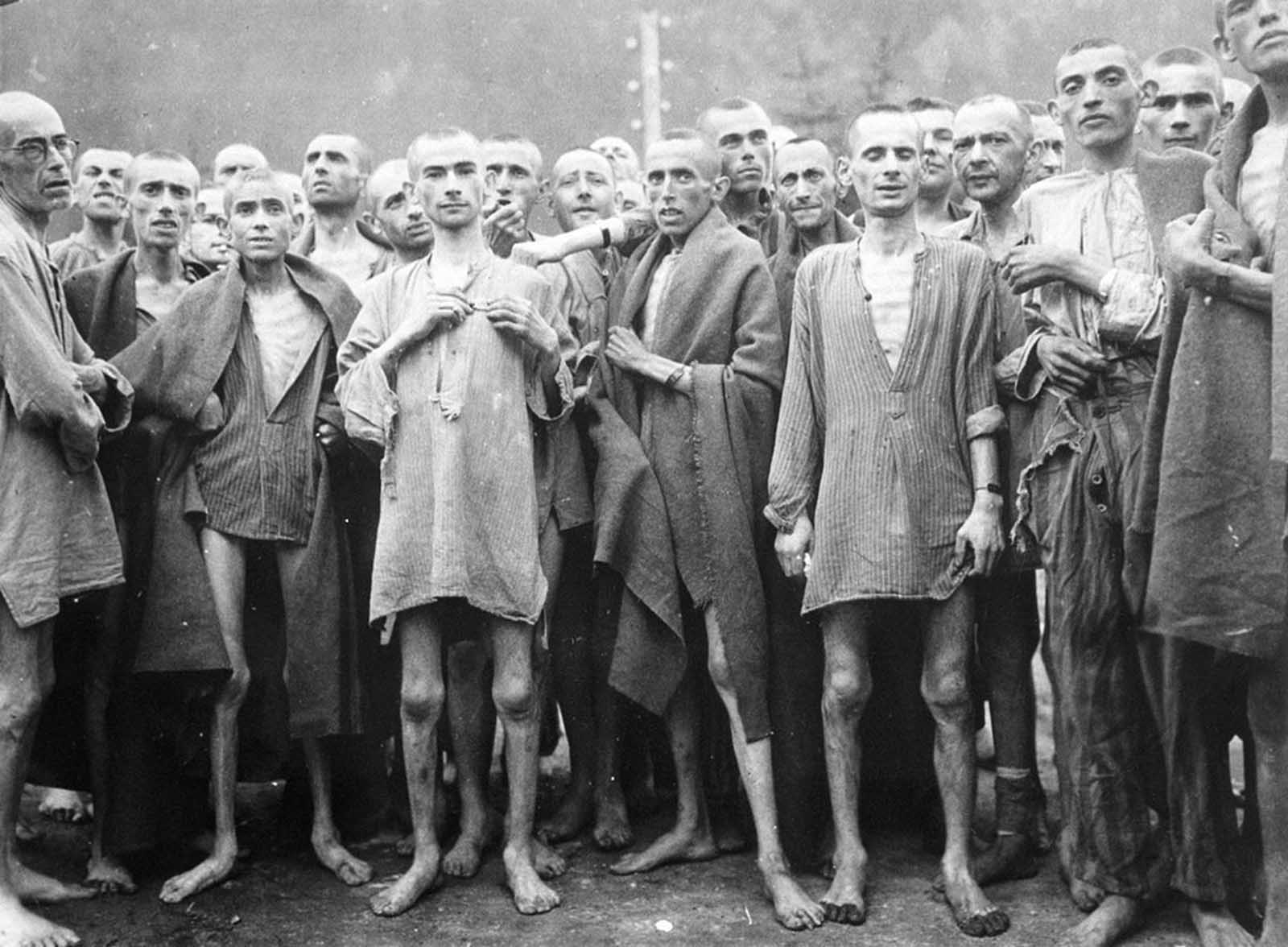 Starved prisoners, nearly dead from hunger, pose in a concentration camp in Ebensee, Austria, on May 7, 1945. The camp was reputedly used for 