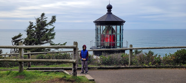 Behind Alan is the lighthouse