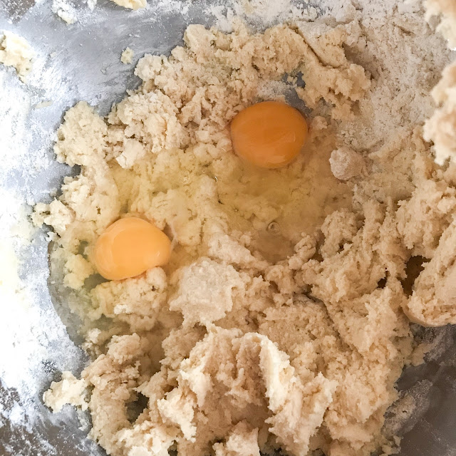 Eggs and juice added to the mixing bowl