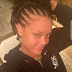 Rihanna goes makeup free with cornrows in her hair