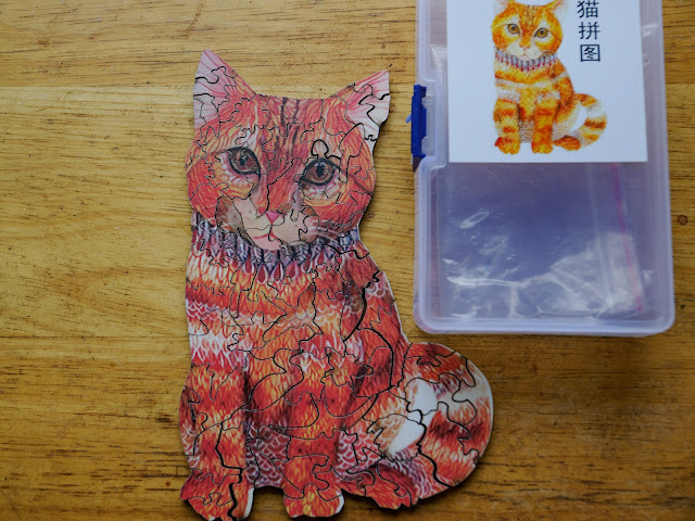 Solved cat jigsaw puzzle