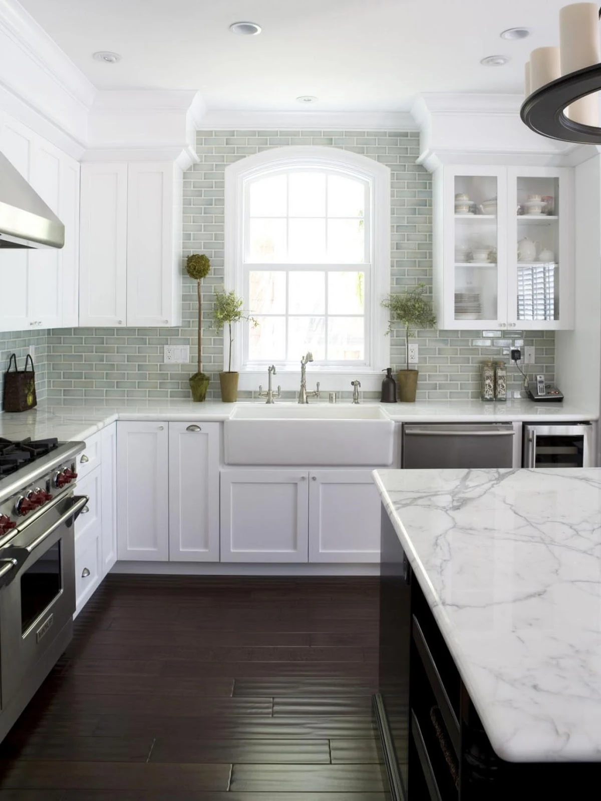 blue and green backsplash white kitchen