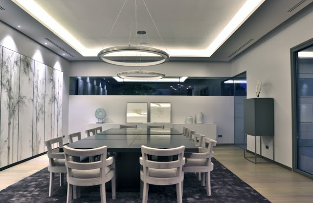 Dining room of The Memory House by A-Cero Architects at night 