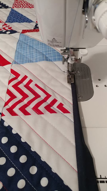 Red, white, and blue half square triangle (HST) quilt