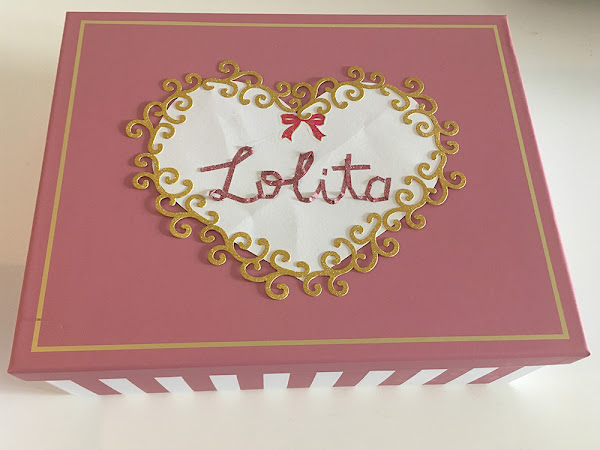 Pink box with the word 'Lolita' on top