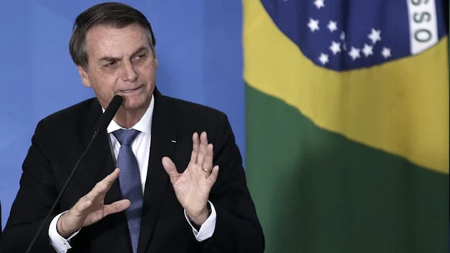 Bolsonaro le dijo a un periodista que tenía ganas de llenarle "la boca de trompadas"