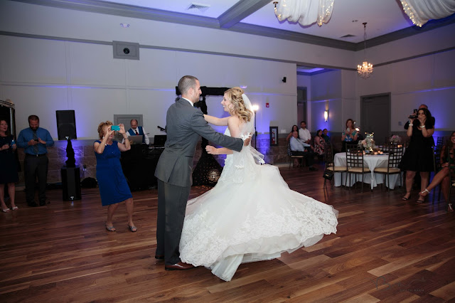 first dance at Noah's Event Venue in Auburn Hills Michigan with dress twirling