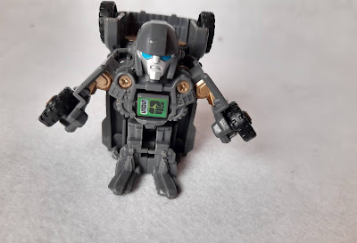 Mini transformer cinza Hasbro Bot Shot - mede 5cm de altura ou comprimento R$ 35.00