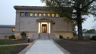 the entrance from Main St was re-done re-purposing some of the red granite