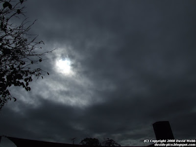 Strange looking clouds cover the sun