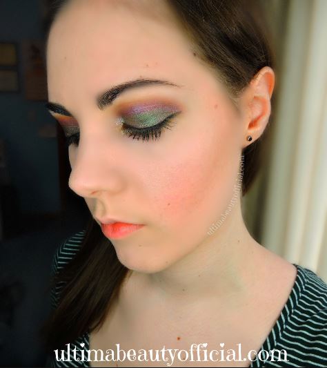 Ultima Beauty, closed eyes wearing purple and green eyeshadow from Too Faced Chocolate Gold Palette