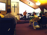 Pastor Tim leading worship