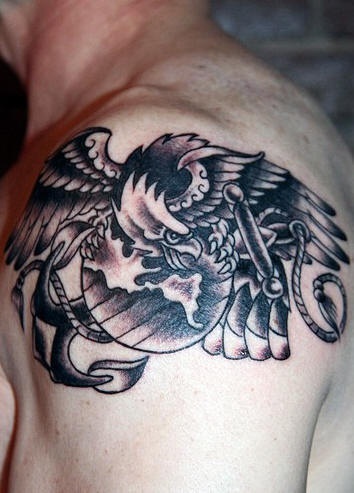 Eagle holding planet and anchor oh shoulder