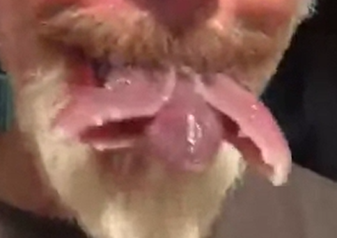 Alien looking tongue on Rick Baker.