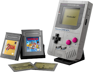 a classic grey Game Boy with cartridges for Link's Awakening and Super Mario Land, all made out of Lego