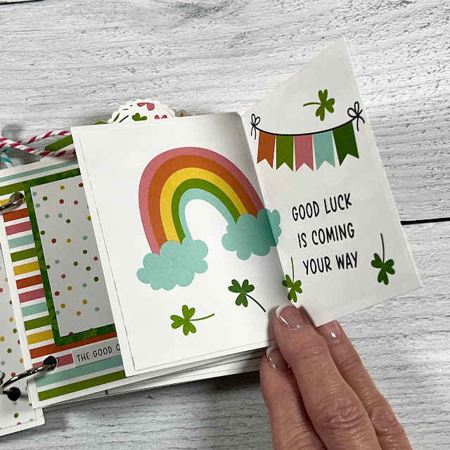 Spring St. Patrick's Day Scrapbook Album folding page with a rainbow, banner, and shamrocks