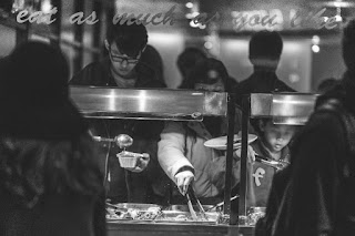 This is a black and white picture of a buffet.