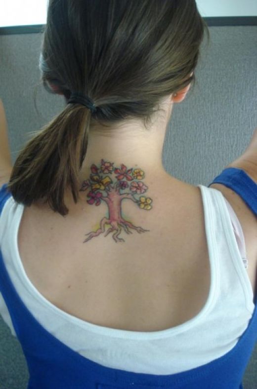 tattoos on back of neck. I dunno whether I like this one or not, a tree tattoo for back of neck 
