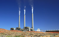 The Navajo Generating Station near Page, AZ burns locally mined coal to generate power for the Central Arizona Project, among other clients. But competition from low-priced natural gas will lead to the plant’s closure by 2019, its owners say. (Photo Credit: Bill Morrow/Creative Commons) Click to Enlarge.