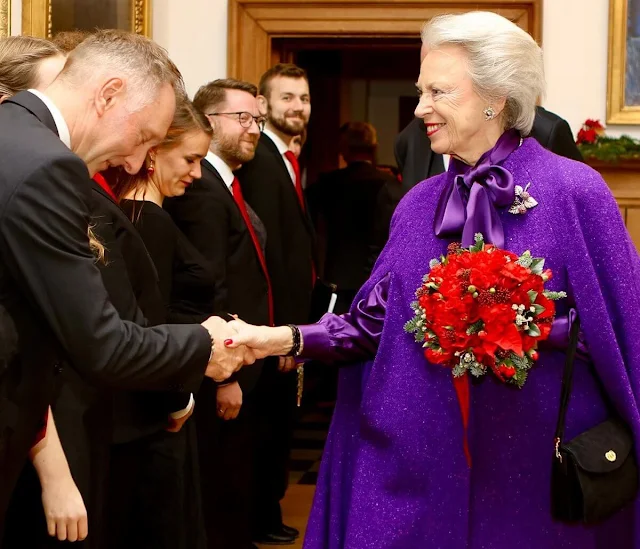 Danish Princess Benedikte wore a purple cape coat and purple dress at Holmens Kirke