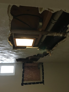 A big hole in my ceiling and wall from water damage