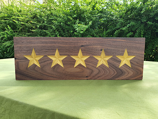 Five star sign in epoxy resin and walnut wood