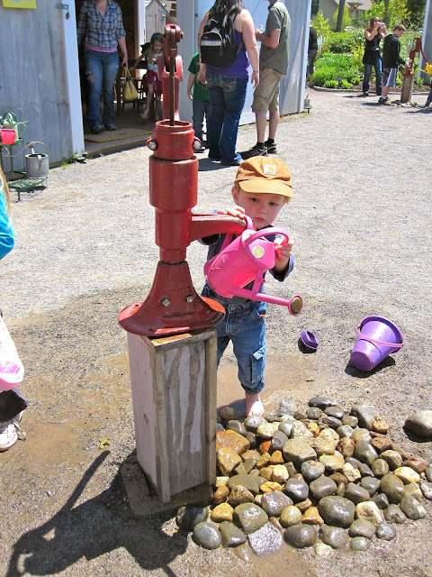 grandson at the water pump