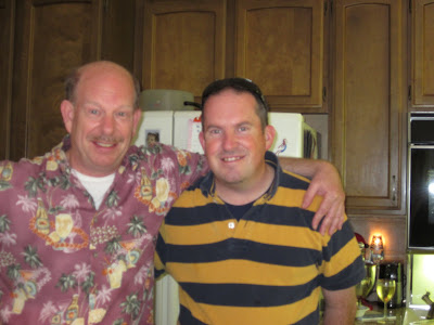 Steven and John standing in the kitchen