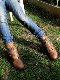 Argentina Boots and Blue jeans, sitting on the grass in a Marrickville backyard