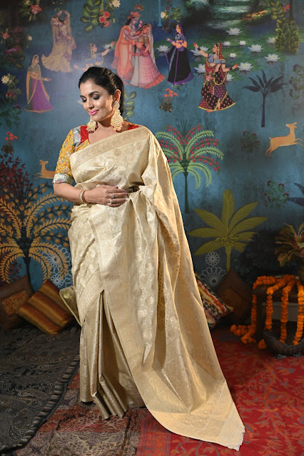 Cream and gold Banarasi silk saree