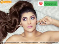 model yashika aannand unseen photo, naked body, laid on bed, wearing big ear rings and artificial nails