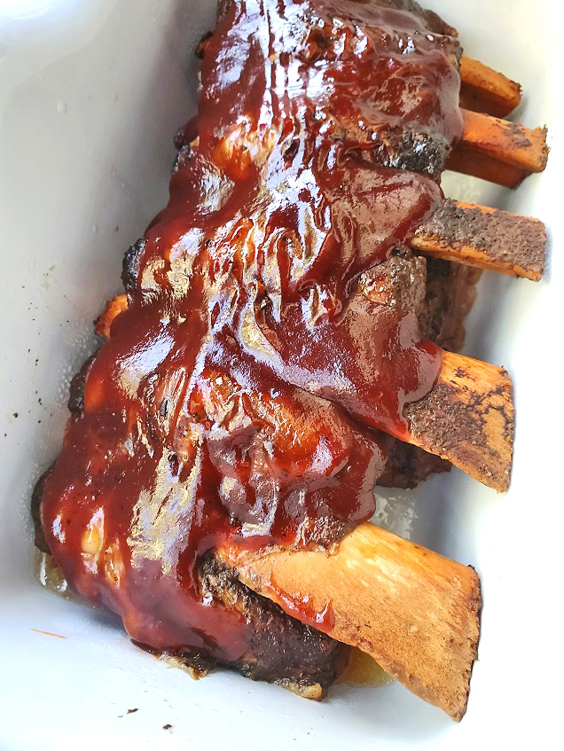 a slab of bourbon bbq slow cooker beef ribs